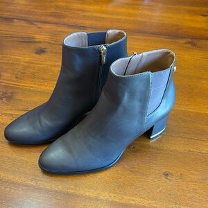 New without tags - Calvin Klein brown leather boots with gold accents. Size 7.5